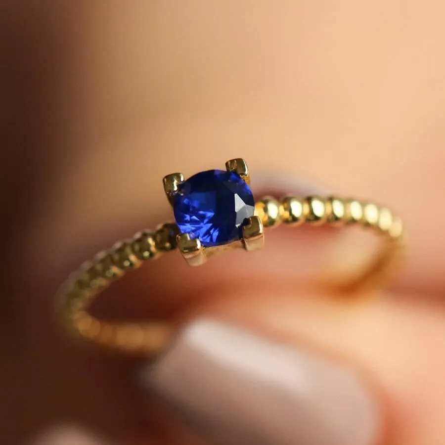 14k Gold Blue Topaz Ring