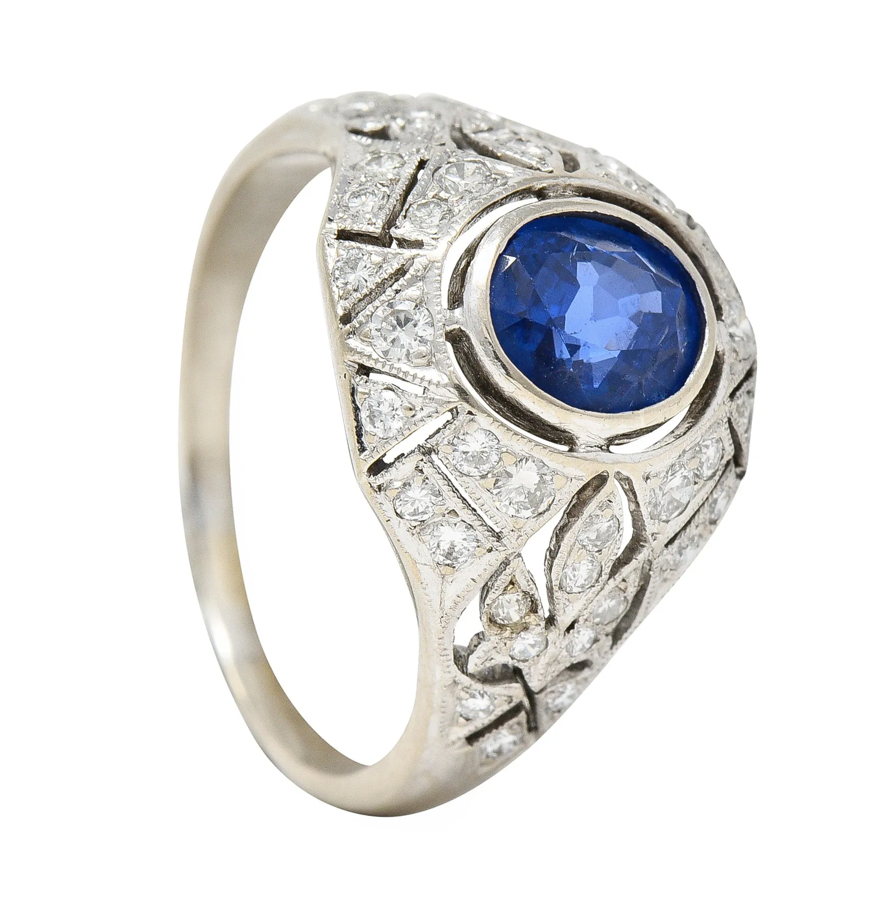 1960's Art Deco Revival 1.72 CTW Oval Cut Sapphire Diamond 14 Karat White Gold Fleur-De-Lis Vintage Bombay Dinner Ring