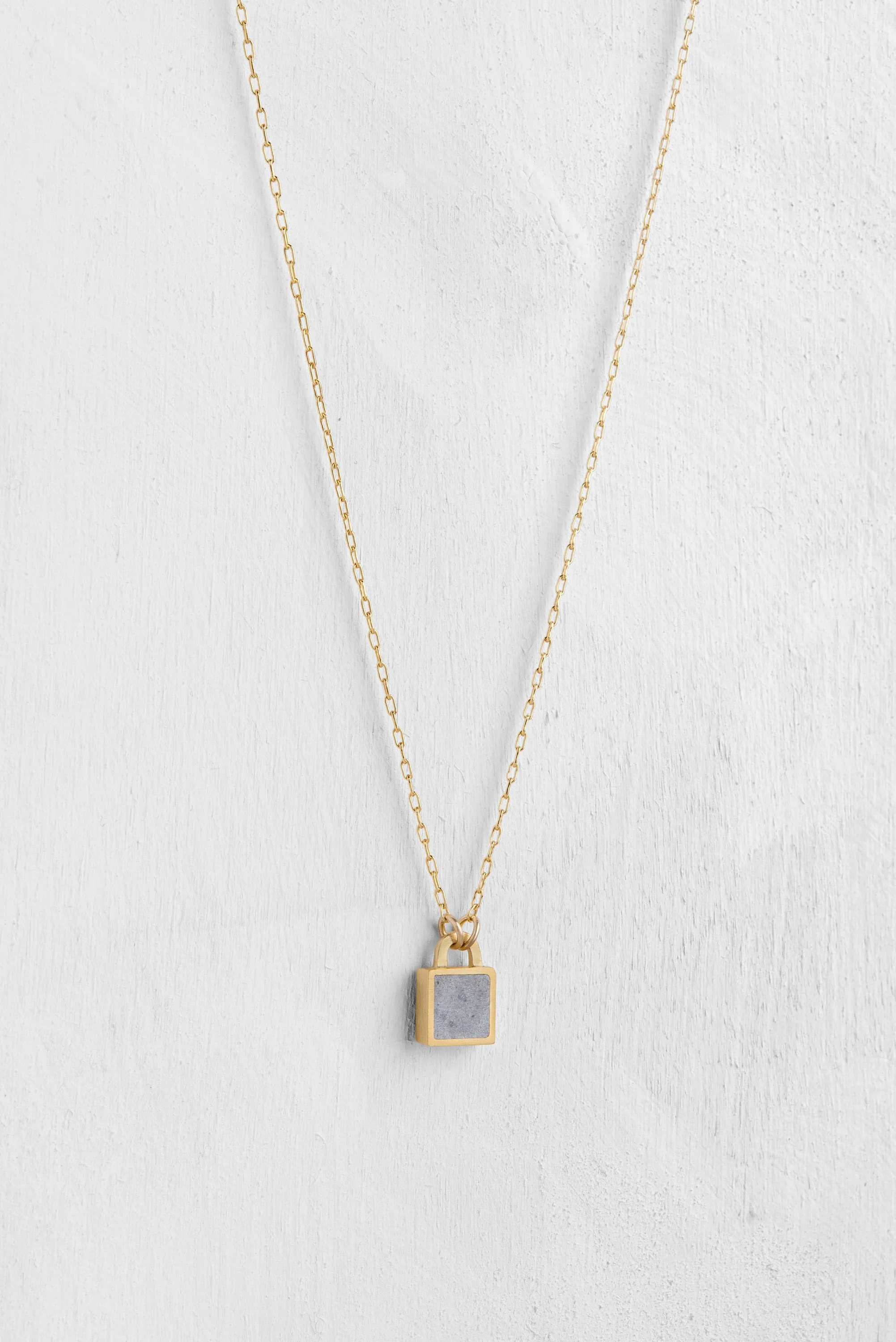 Tiny Sq Concrete & Gold lock pendant